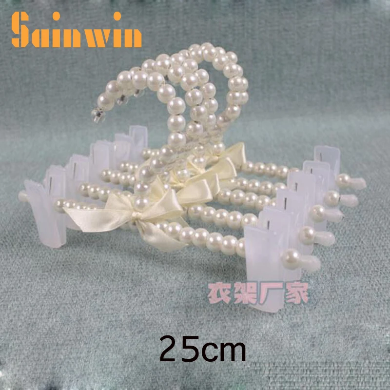 Sainwin 5pcs/lot 25cm Children Plastic Hanger Baby Clothes Rack Pants Clips Child Pearl Bra hangers for clothes
Sainwin 5pcs/lot 25cm Children Plastic Hanger Baby Clothes Rack Pants Clips Child Pearl Bra hangers for clothes