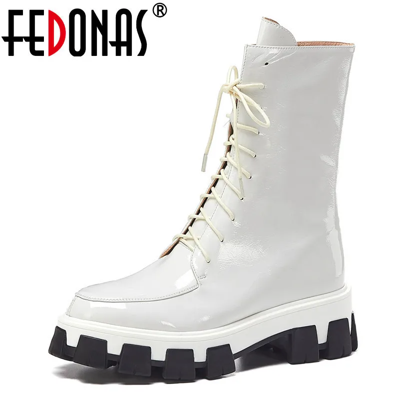 FEDONAS New Winter Women Ankle Boots Cow Patent Leather Short Riding Boots Fashion Party Cross-tied Zipper Platforms Shoes Woman
FEDONAS New Winter Women Ankle Boots Cow Patent Leather Short Riding Boots Fashion Party Cross-tied Zipper Platforms Shoes Woman