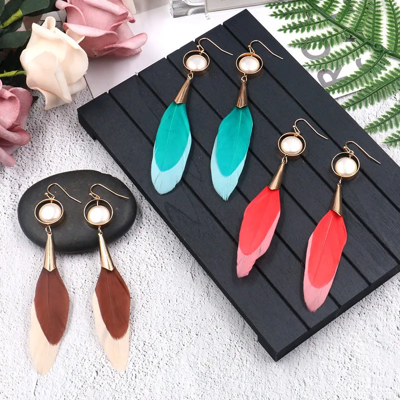 Explosion models bohemian geometric round string pearl double-layer feathers multi-color long women's alloy gold earrings
Explosion models bohemian geometric round string pearl double-layer feathers multi-color long women's alloy gold earrings