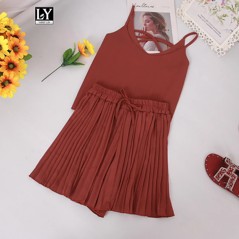 Ly Varey Lin Women 2 Piece Set Sexy V Neck Spaghetti Strap Backless Tops And High Waist Pleated Short Pants Female Suit Set
Ly Varey Lin Women 2 Piece Set Sexy V Neck Spaghetti Strap Backless Tops And High Waist Pleated Short Pants Female Suit Set