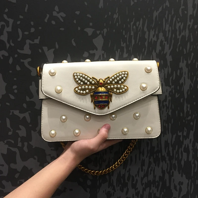 Summer small bag female 2018 new wild girl shoulder Messenger bag small fresh envelope bag chain bee bag
Summer small bag female 2018 new wild girl shoulder Messenger bag small fresh envelope bag chain bee bag