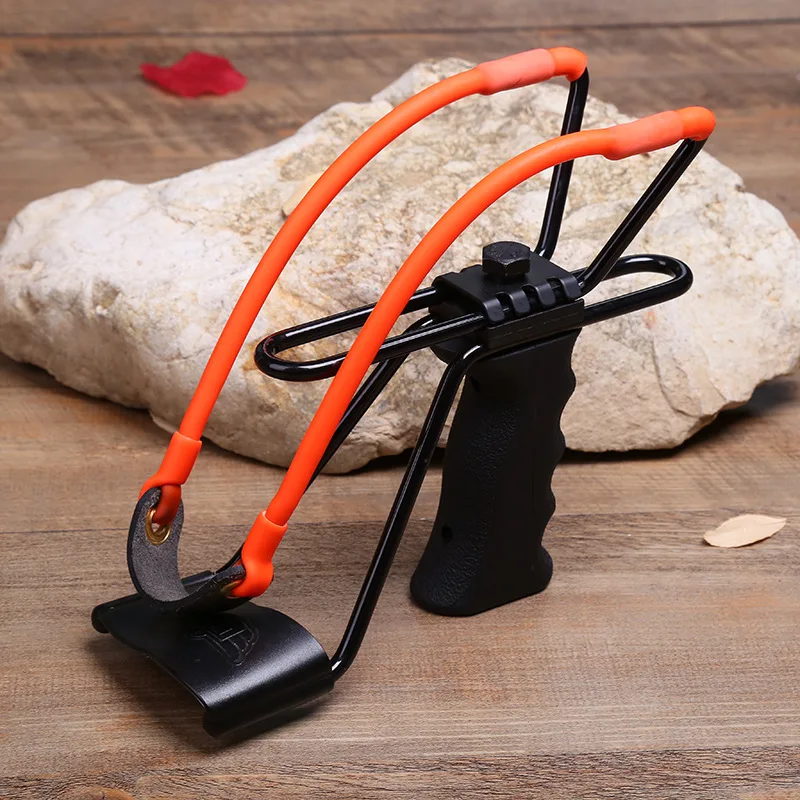 

Strong Outdoor hunting Heavy Slingshot Catapult Rubber Band Hunting Metal With Wrist Rest Outdoor Handhold High Quality Random
