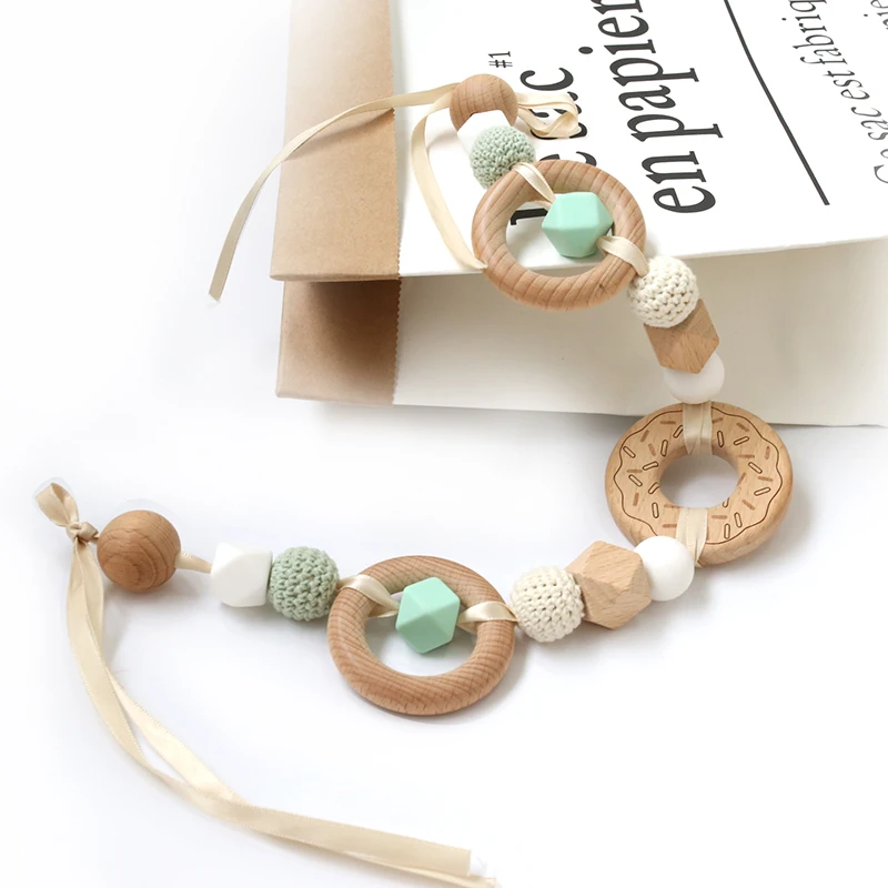 Baby Toys Rattle Crib Mobile Baby Teethers Beech Wooden Donut Bed Bell Hanging Pendant Decor Stroller Accessories Pacifier Chain
Baby Toys Rattle Crib Mobile Baby Teethers Beech Wooden Donut Bed Bell Hanging Pendant Decor Stroller Accessories Pacifier Chain