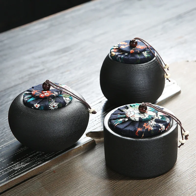 Black pottery antique tea pot small 150g threaded tea cans sealed cans candy cans Pu'er Tieguanyin tea pot
Black pottery antique tea pot small 150g threaded tea cans sealed cans candy cans Pu'er Tieguanyin tea pot