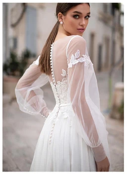 Fairy Beach Wedding Dress Lace Appliques New Design Buttons Back Bridal Dress floor Length Wedding Gowns
Fairy Beach Wedding Dress Lace Appliques New Design Buttons Back Bridal Dress floor Length Wedding Gowns