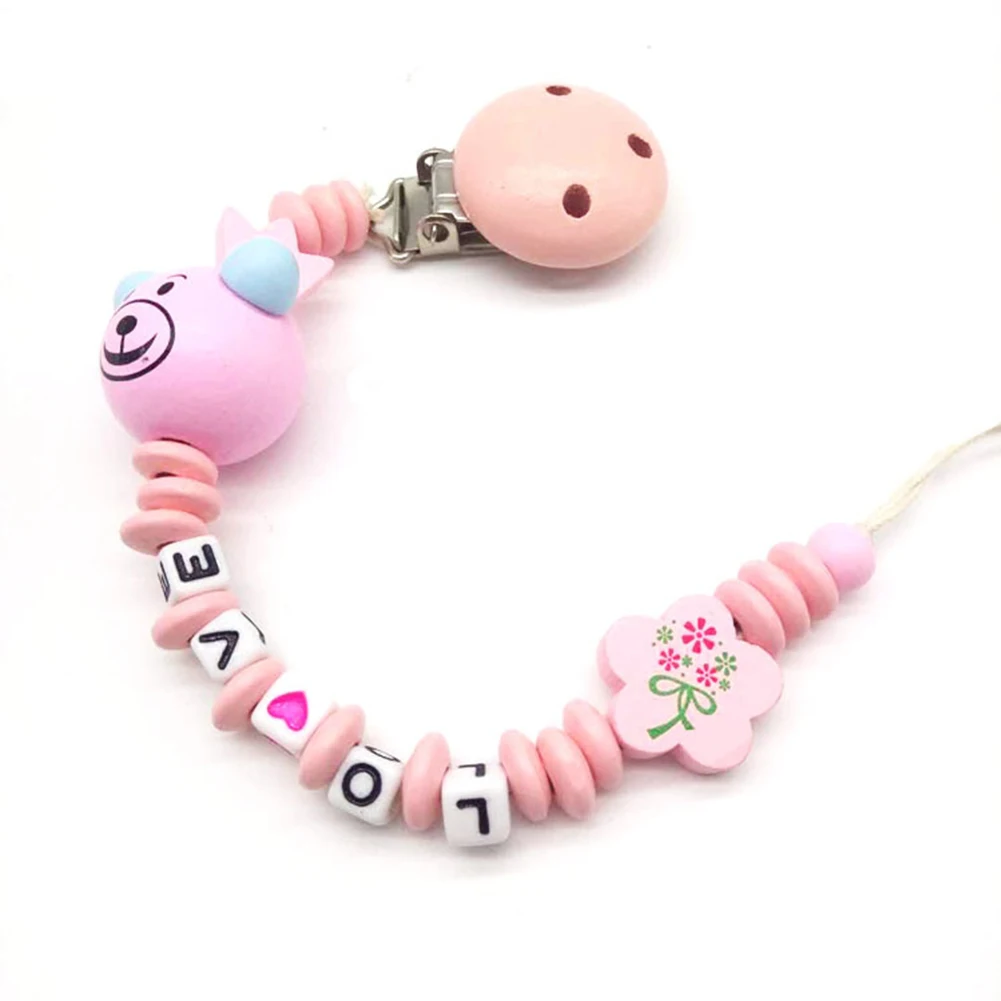 Pacifier Clip Chew Toy Chain Cute Anti-falling Soother Gift Wooden Letters Portable Shower Accessories Teething Beads Baby
Pacifier Clip Chew Toy Chain Cute Anti-falling Soother Gift Wooden Letters Portable Shower Accessories Teething Beads Baby