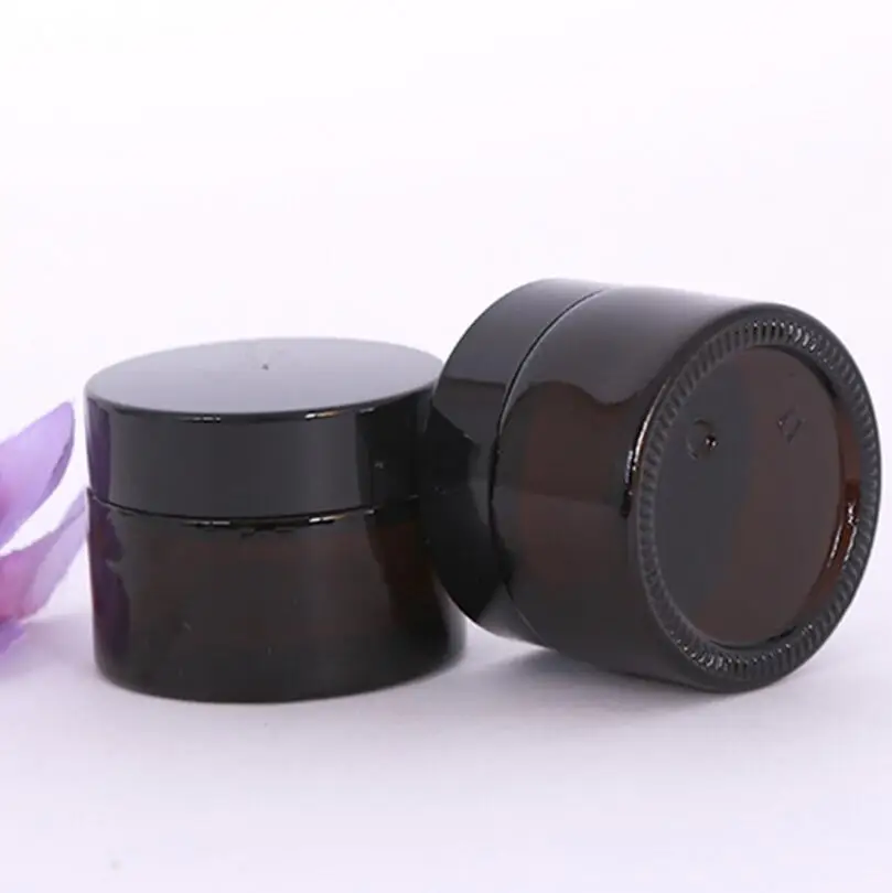 Wholesale 200pcs 30G amber glass cream jar with black lid, 1 oz width mouth glass bottle for cosmetic use
Wholesale 200pcs 30G amber glass cream jar with black lid, 1 oz width mouth glass bottle for cosmetic use