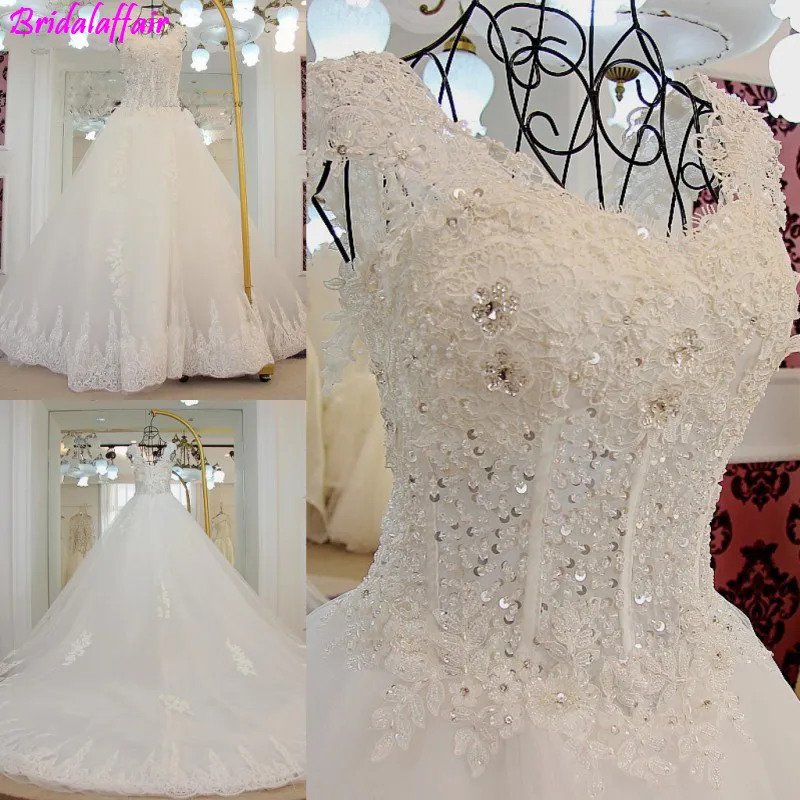 Luxury Crystal Wedding Dresses 2019 Lace Up Back Applique Dubai Wedding Dresses Ball Gown Plus Size Bride Dress Robe De Mariee
Luxury Crystal Wedding Dresses 2019 Lace Up Back Applique Dubai Wedding Dresses Ball Gown Plus Size Bride Dress Robe De Mariee