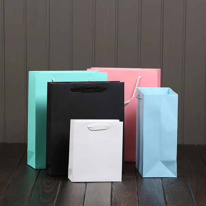 Solid Paper Gift Bag Laminated Customize Logo Accetable Festival Party Event Commercial Company Advertising Cloth Gift Carrier
Solid Paper Gift Bag Laminated Customize Logo Accetable Festival Party Event Commercial Company Advertising Cloth Gift Carrier