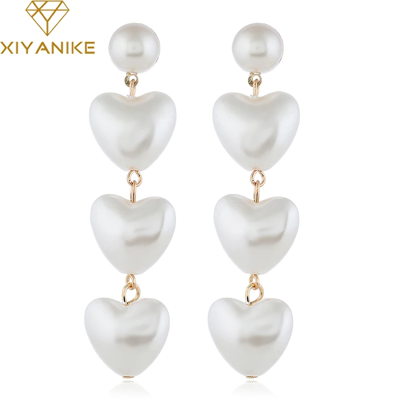 XIYANIKE 2019 New Fashion Trendy Sweet Tassel Love Heart Imitated Pearl Drop Earrings For Women Girls Jewelry Female Gifts E606
XIYANIKE 2019 New Fashion Trendy Sweet Tassel Love Heart Imitated Pearl Drop Earrings For Women Girls Jewelry Female Gifts E606