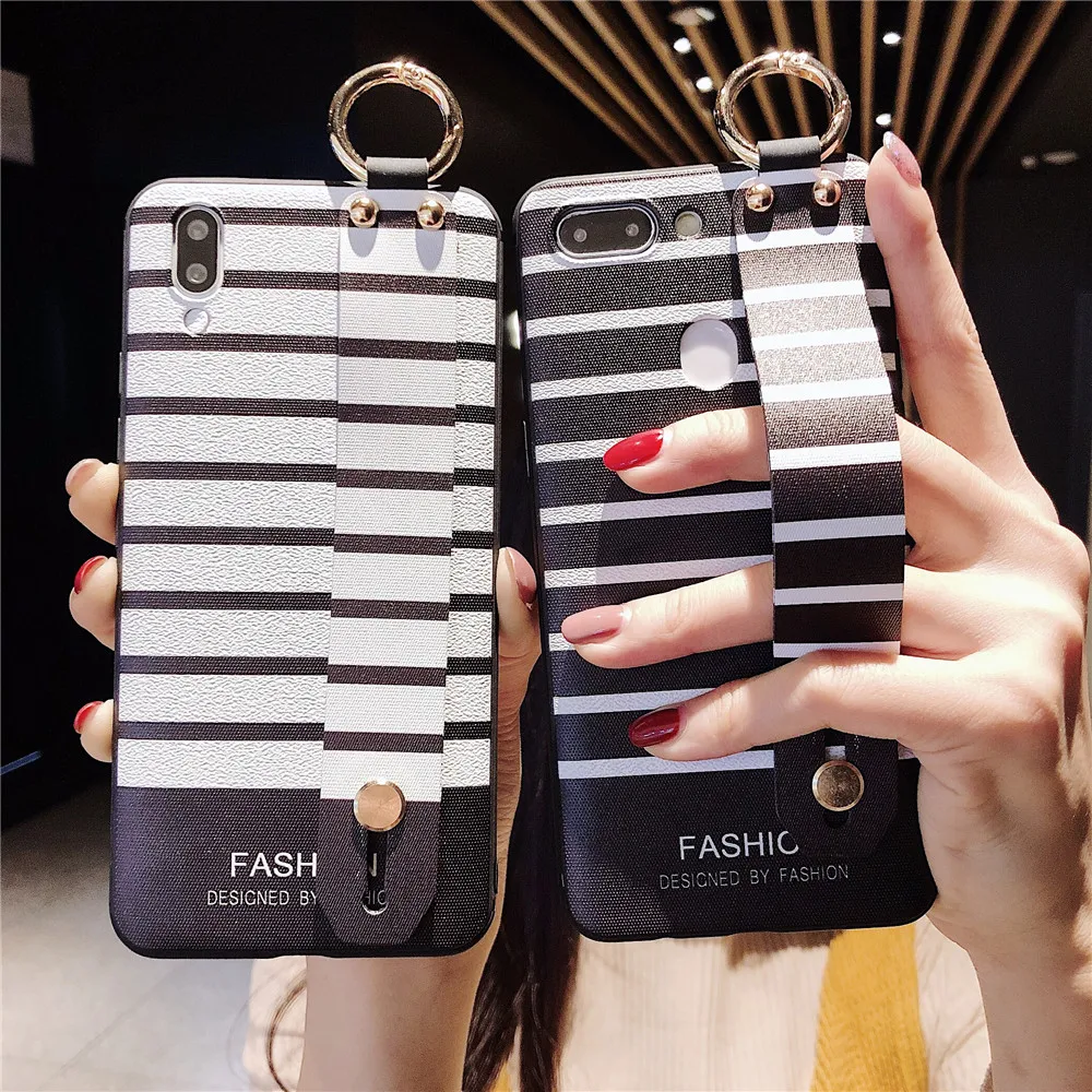 Wrist Strap Phone Case for IPhone X XR XS MAX stripe Tassel Wristband Phone Cases for Iphone 7 8 6S 5S SE Plus Soft Strap Covers
Wrist Strap Phone Case for IPhone X XR XS MAX stripe Tassel Wristband Phone Cases for Iphone 7 8 6S 5S SE Plus Soft Strap Covers