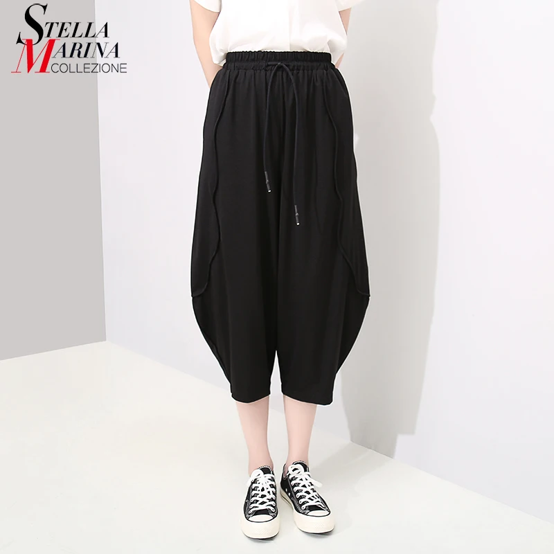 2019 Korean Style Women Solid Black Wide Legs Pants Elastic Waist Drawstring Calf Length Pants Lady Casual Pants Trousers 5183
2019 Korean Style Women Solid Black Wide Legs Pants Elastic Waist Drawstring Calf Length Pants Lady Casual Pants Trousers 5183