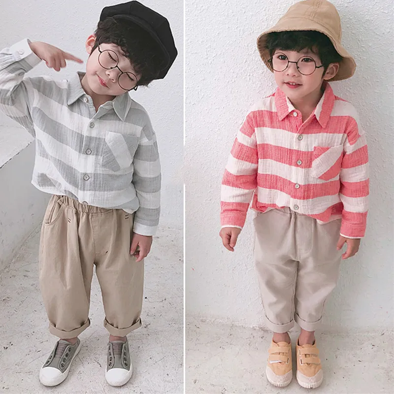 The Boy In The Spring Of The New Large And Medium-Sized Children Children Baby Cotton Wide Stripe Shirt
The Boy In The Spring Of The New Large And Medium-Sized Children Children Baby Cotton Wide Stripe Shirt