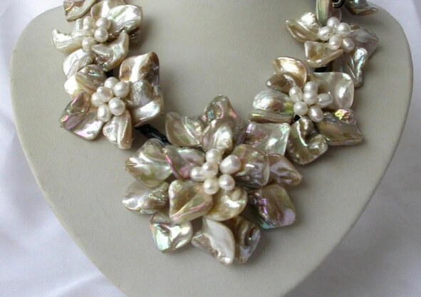 huij 002237 classic white baroque freshwater pearl shell flower leather necklace
huij 002237 classic white baroque freshwater pearl shell flower leather necklace