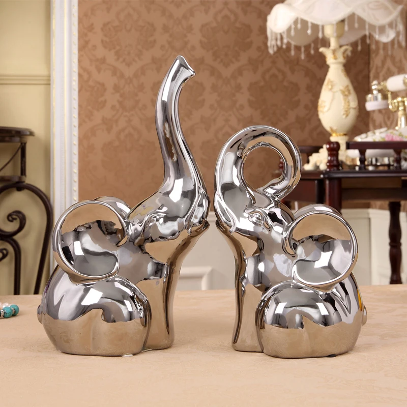 Europe 2pcs/set Gold/Silver Lucky Feng Shui Elephant Figurine Ceramic Electroplating animals Crafts Home Office tabletop Decor
Europe 2pcs/set Gold/Silver Lucky Feng Shui Elephant Figurine Ceramic Electroplating animals Crafts Home Office tabletop Decor