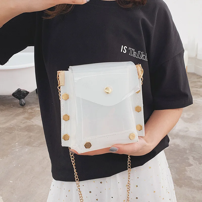 New Style Lady PVC Jelly Rivet Square Pack Candy-colored Shoulder-slung Mobile Phone Package
New Style Lady PVC Jelly Rivet Square Pack Candy-colored Shoulder-slung Mobile Phone Package