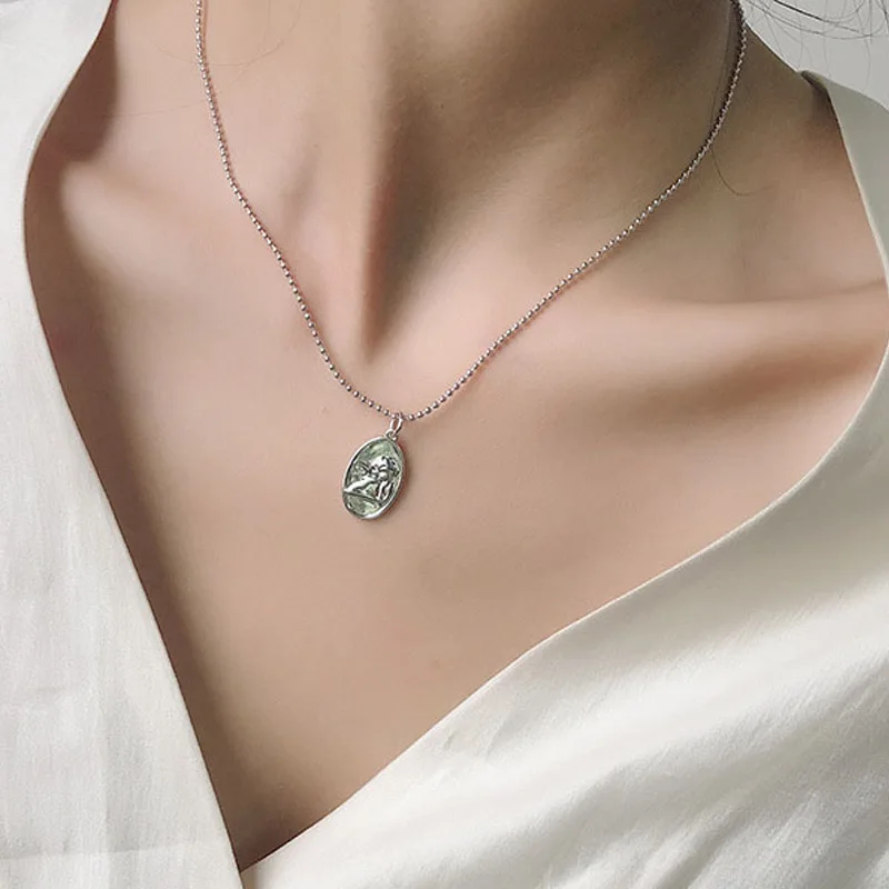 2018 Simple Vintage Silver Color Round Beads Chain Angel Coin Geometric Oval Pendant Sweater Necklace for Women Charm Jewelry
2018 Simple Vintage Silver Color Round Beads Chain Angel Coin Geometric Oval Pendant Sweater Necklace for Women Charm Jewelry
