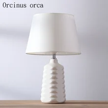 Nordic simple modern white table lamp bedroom warm bed lamp American creative ceramic decorative table lamp free shipping 
Nordic simple modern white table lamp bedroom warm bed lamp American creative ceramic decorative table lamp free shipping