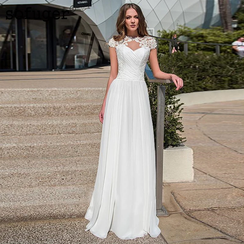 White Chiffon Cap Sleeves A-line Lace Appliques Beadings Floor Length Bridal Wedding Dress Robe De Mariee Sofuge Boho Dubai Arab
White Chiffon Cap Sleeves A-line Lace Appliques Beadings Floor Length Bridal Wedding Dress Robe De Mariee Sofuge Boho Dubai Arab