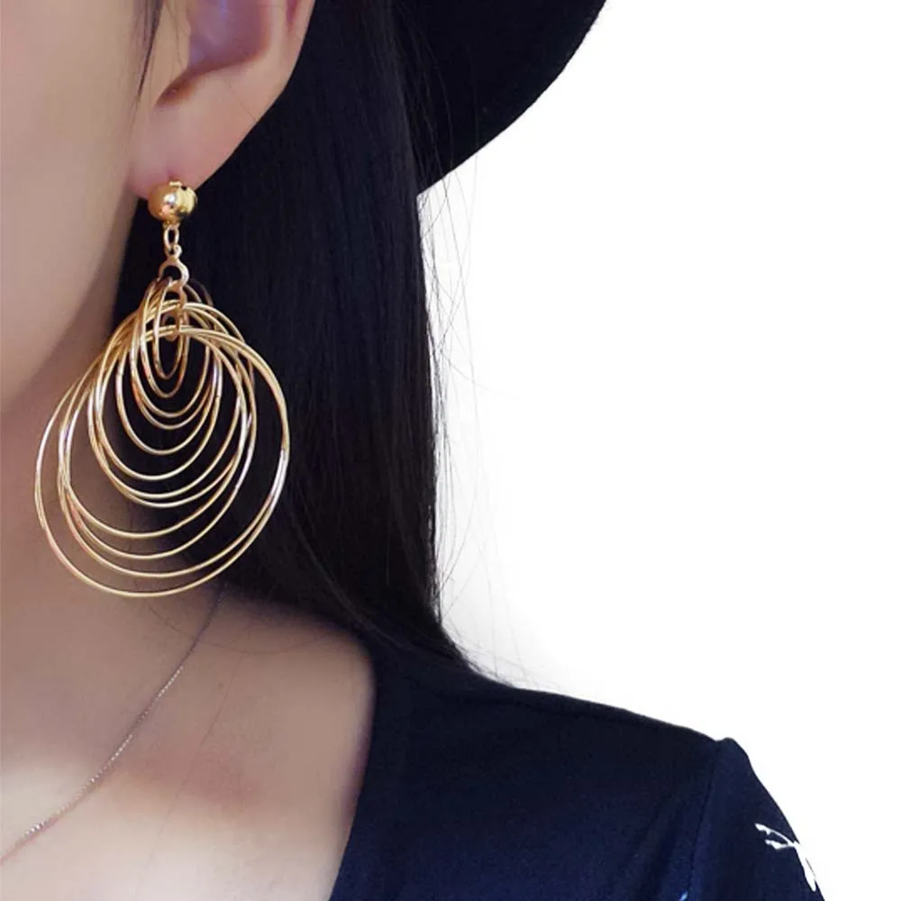 Korean multi-layer metal circle earrings long exaggerated earrings European and American women's ball club earrings
Korean multi-layer metal circle earrings long exaggerated earrings European and American women's ball club earrings
