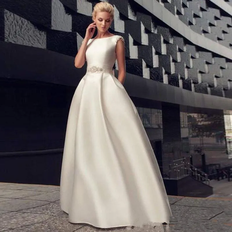 Simple Satin Wedding Dresses Scoop Crystal Beaded Bow Sash Backless Wedding Dress Floor Length Bridal Gowns Long Custom Size
Simple Satin Wedding Dresses Scoop Crystal Beaded Bow Sash Backless Wedding Dress Floor Length Bridal Gowns Long Custom Size