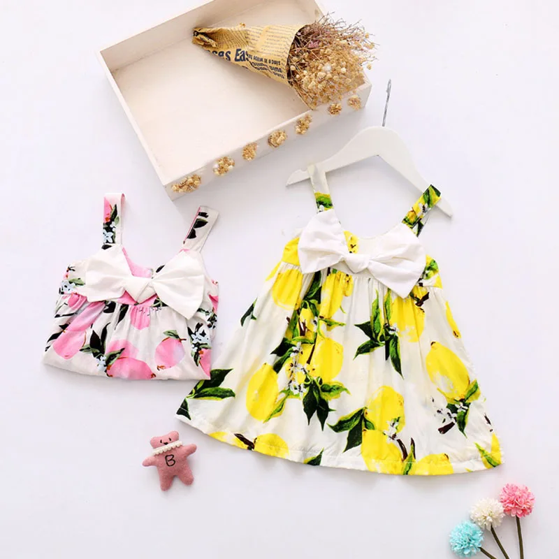 2017 Summer Baby Girls Sleeveless Shoulder Strap Bow Lemon Floral Print Princess Beach Kids Tutu Dress vestido infantil
2017 Summer Baby Girls Sleeveless Shoulder Strap Bow Lemon Floral Print Princess Beach Kids Tutu Dress vestido infantil