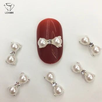 LEAMX 10 PCS/bag Mini Pearl Bow Nails Art Decorations 3D Bow Tie Metal Nail Jewelry Accessories DIY Manicure Tips L426
LEAMX 10 PCS/bag Mini Pearl Bow Nails Art Decorations 3D Bow Tie Metal Nail Jewelry Accessories DIY Manicure Tips L426