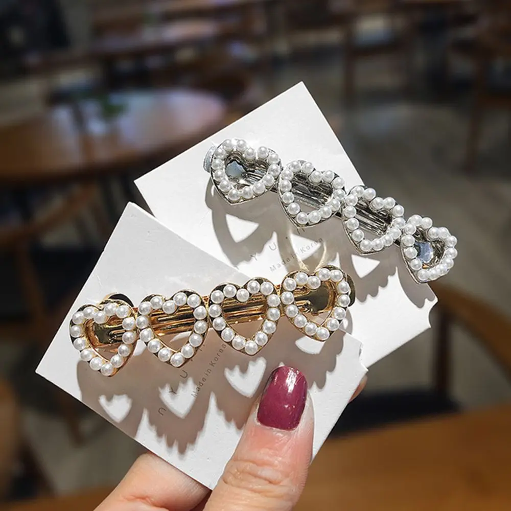 Cute Love Heart Pearl Metal Hair Clip Gold Silver Hollow Hairpin Barrettes Hairgrip Hair Accessories for Women Girls New Arrival
Cute Love Heart Pearl Metal Hair Clip Gold Silver Hollow Hairpin Barrettes Hairgrip Hair Accessories for Women Girls New Arrival