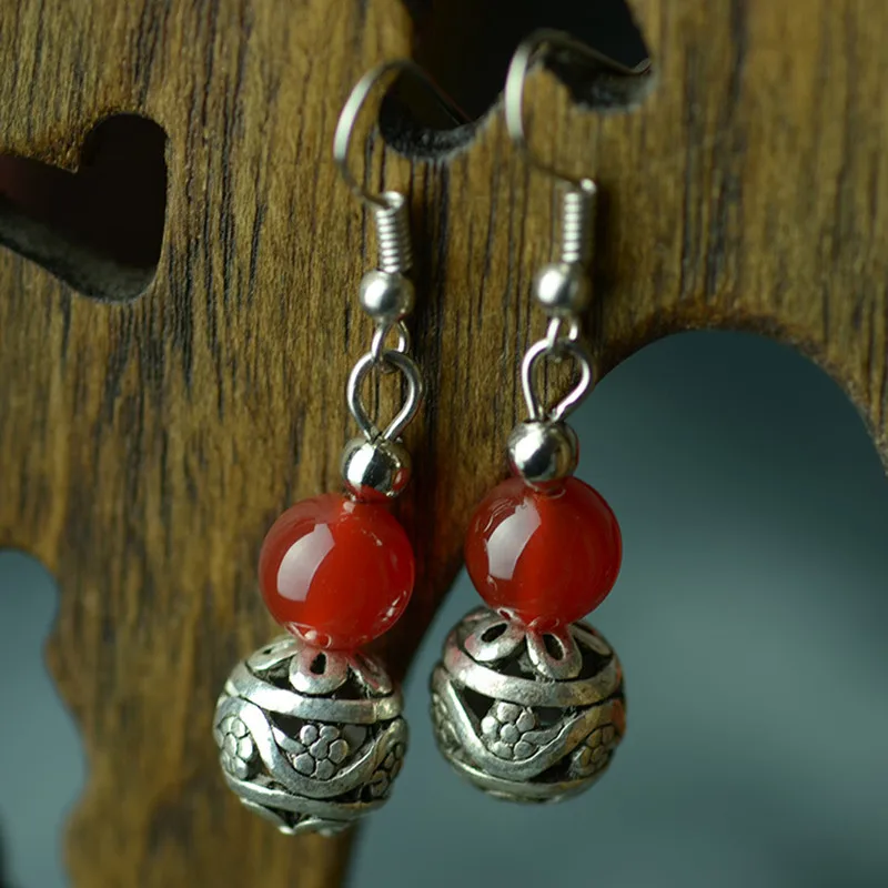 Bohemian Drop Earrings Red Stone Tibetan Silver Hollow Fortune Ball Ethnic Stylish Designer Earring for Women Fashion Jewelry
Bohemian Drop Earrings Red Stone Tibetan Silver Hollow Fortune Ball Ethnic Stylish Designer Earring for Women Fashion Jewelry