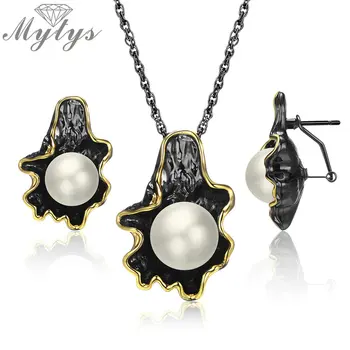 Mytys Big Pearl Black Gun Jewelry Sets Earrings Necklace Sets Pearl Leaf Design Gold Wire Frames Vintage Noble Jewelry CN514 
Mytys Big Pearl Black Gun Jewelry Sets Earrings Necklace Sets Pearl Leaf Design Gold Wire Frames Vintage Noble Jewelry CN514