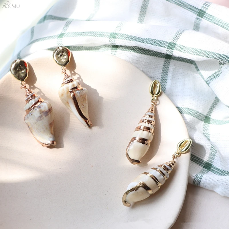 AOMU 2019 New Korea Fashion Cute Sea Shell Conch Pearl Stud Earrings Gifts For Women Vintage Geometric Boho Ocean Beach Jewelry
AOMU 2019 New Korea Fashion Cute Sea Shell Conch Pearl Stud Earrings Gifts For Women Vintage Geometric Boho Ocean Beach Jewelry