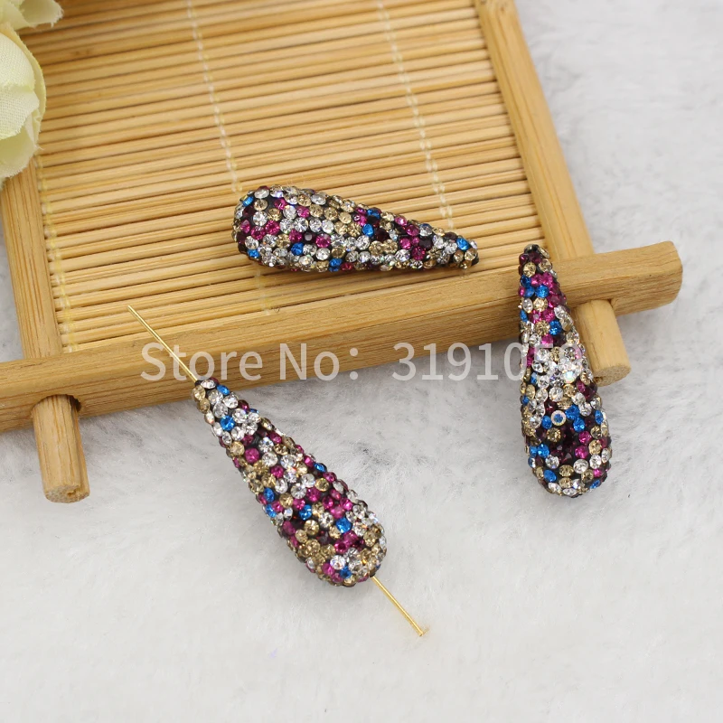 

Beautiful multicolored natural crystal stone special long oval beads in a package of 10 about 27 grams