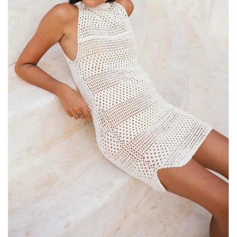 New Crochet Knitted dress Beach Tunic Pareo Sleeveless Sheath Mini Sexy Bodycon Dress O Neck Off Shoulder Hollow out Women Dress
New Crochet Knitted dress Beach Tunic Pareo Sleeveless Sheath Mini Sexy Bodycon Dress O Neck Off Shoulder Hollow out Women Dress