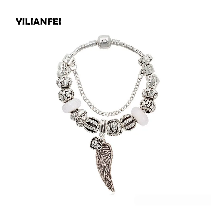 Silver Plated wing heart pendant Fashion Elegant Charm Pan Bracelets & Bangles with white Chamilia Beads For Women BT0129
Silver Plated wing heart pendant Fashion Elegant Charm Pan Bracelets & Bangles with white Chamilia Beads For Women BT0129