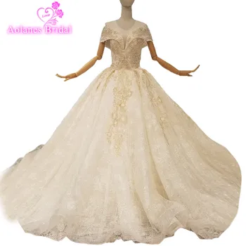 2018 Champagne Lace Sleeveless V-neck Cathedral Train Wedding Dresses Floor-length Backless Ball Gown Princess Bridal Gowns
2018 Champagne Lace Sleeveless V-neck Cathedral Train Wedding Dresses Floor-length Backless Ball Gown Princess Bridal Gowns