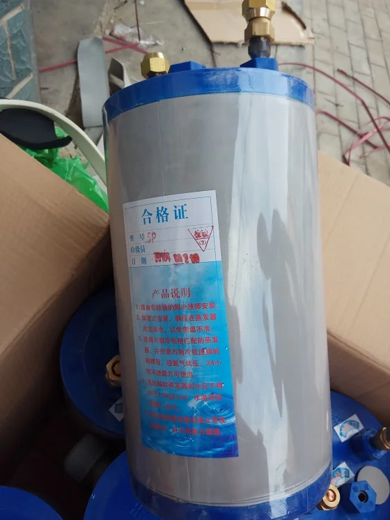 Titanium barrel heat exchanger. 1.0HP seafood tank fish tank titanium drum evaporator. Refrigeration chiller.
Titanium barrel heat exchanger. 1.0HP seafood tank fish tank titanium drum evaporator. Refrigeration chiller.