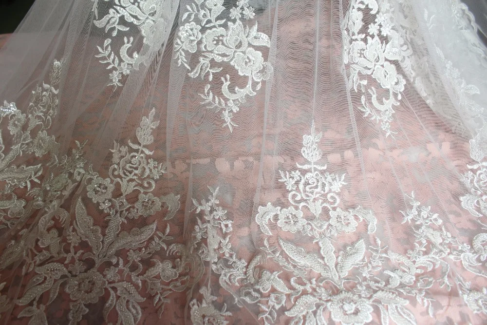Handmade wedding decoration ivory bead lace fabric,exquisite bridal lace fabric with pearl and sequins 5 yards.
Handmade wedding decoration ivory bead lace fabric,exquisite bridal lace fabric with pearl and sequins 5 yards.