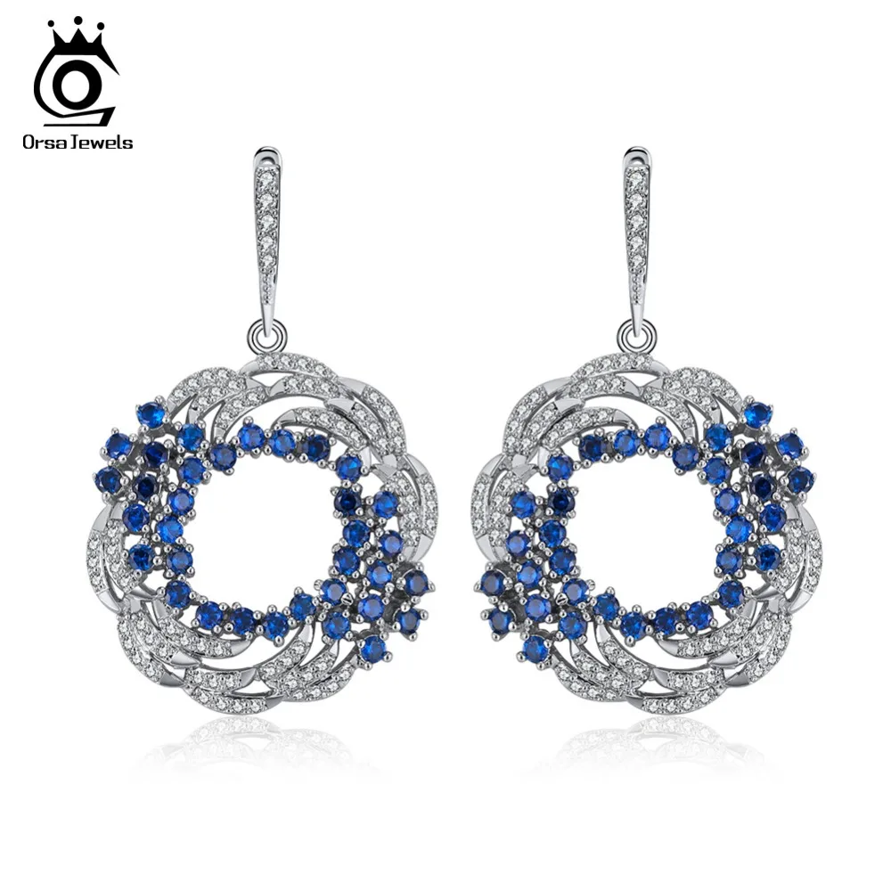 ORSA JEWELS Trendy Drop Earrings Hollow Design Pave Blue & Clear AAA Cubic Zircon Luxury Wedding Earring Jewelry For Women OE183
ORSA JEWELS Trendy Drop Earrings Hollow Design Pave Blue & Clear AAA Cubic Zircon Luxury Wedding Earring Jewelry For Women OE183