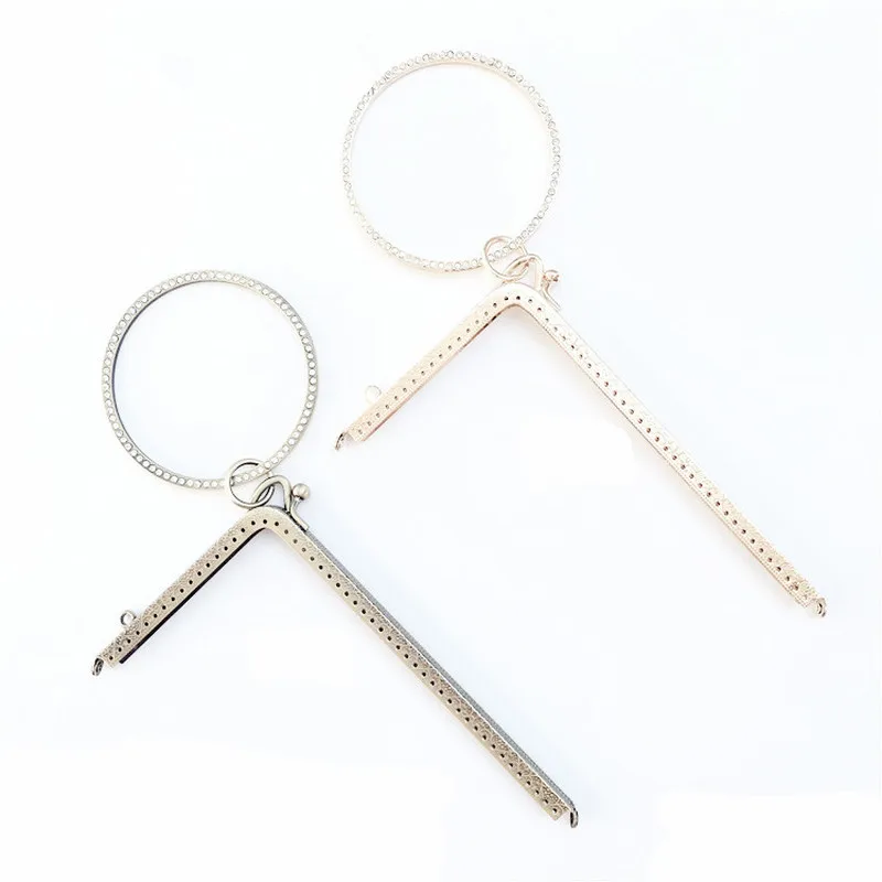 Bronze,Gold Tone Metal Purse Frame Bag Handle L Shape Round Circle Crystal Kiss Clasp Delicate Lock Luggage Accessories 18.5CM 
Bronze,Gold Tone Metal Purse Frame Bag Handle L Shape Round Circle Crystal Kiss Clasp Delicate Lock Luggage Accessories 18.5CM