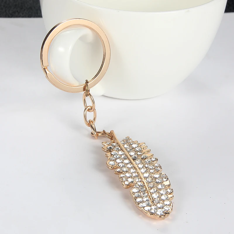 SUKI Gold Color Feather Dangle Keychain Clear Crystal Rhinestone Keychain Ring Holder for Car Bag Pendant Tribe Accessories
SUKI Gold Color Feather Dangle Keychain Clear Crystal Rhinestone Keychain Ring Holder for Car Bag Pendant Tribe Accessories
