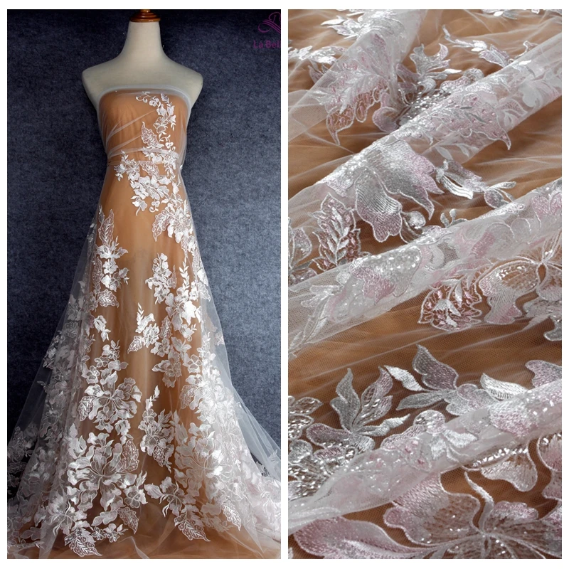La Belleza High quality Off white mixed silver/pink/champgane sequins on mesh wedding dress lace fabric 1 yard
La Belleza High quality Off white mixed silver/pink/champgane sequins on mesh wedding dress lace fabric 1 yard