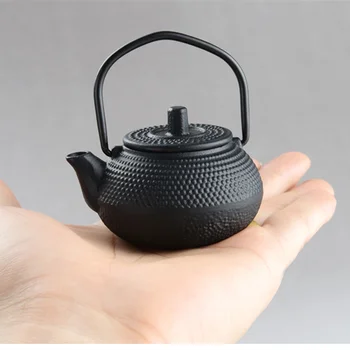 New 50ml~100ml Mini Iron Kettle Cast Iron Teapot Small Pot of Gold Kung Fu Tea Sets Tea Pet Home Decoration Gifts
New 50ml~100ml Mini Iron Kettle Cast Iron Teapot Small Pot of Gold Kung Fu Tea Sets Tea Pet Home Decoration Gifts