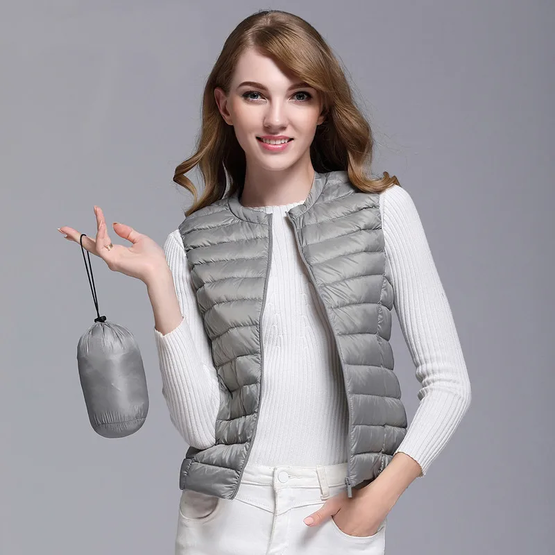 New Autumn Winter Ultra Light 90% White Duck Down Vest Women Bottoming Short Waistcoat Female OL Sleeveless Windproof Vest Mw130
New Autumn Winter Ultra Light 90% White Duck Down Vest Women Bottoming Short Waistcoat Female OL Sleeveless Windproof Vest Mw130