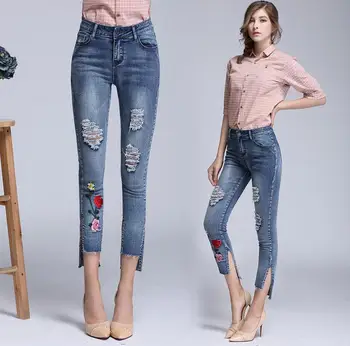 2018 autumn new European and American large yards nine jeans women embroidery hole pants Split pencil pants
2018 autumn new European and American large yards nine jeans women embroidery hole pants Split pencil pants