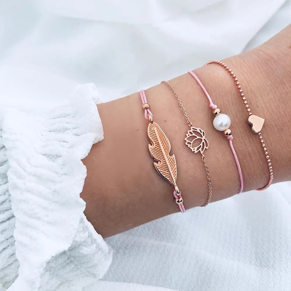 EN Bohemian Lotus Pearl Heart Feather Bracelet Set Women Retro Rope Chain Geometry Charm Bracelet 2019 Fashion Jewelry Gift
EN Bohemian Lotus Pearl Heart Feather Bracelet Set Women Retro Rope Chain Geometry Charm Bracelet 2019 Fashion Jewelry Gift