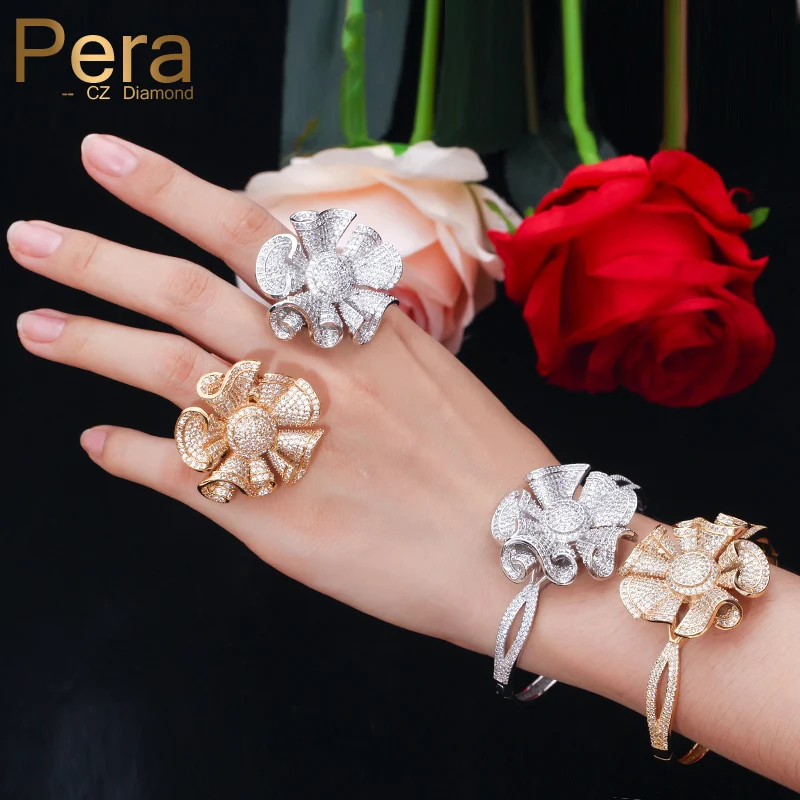 Pera Luxury Yellow Gold Color Full Shinning Cubic Zirconia Big Flower Shape Bangle and Ring Women Engagement Party Jewelry Z031
Pera Luxury Yellow Gold Color Full Shinning Cubic Zirconia Big Flower Shape Bangle and Ring Women Engagement Party Jewelry Z031