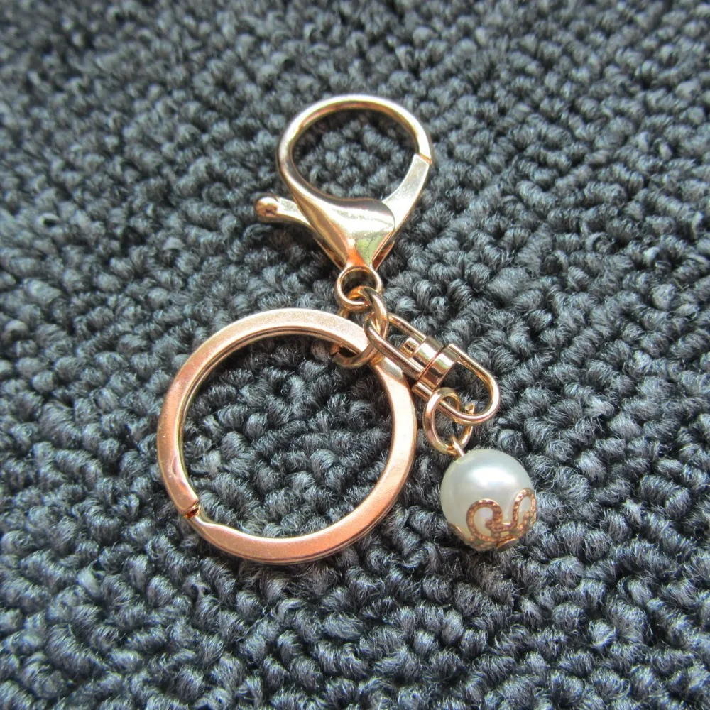 Fashion Gold Keychain Accessories Pearl Key Chain Ring DIY Jewelry Woman Bag Charms Man Car Keyring Wedding Party Gift Trinket
Fashion Gold Keychain Accessories Pearl Key Chain Ring DIY Jewelry Woman Bag Charms Man Car Keyring Wedding Party Gift Trinket