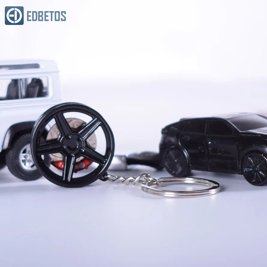Rotatable Designs Red Auto Wheel Rim Keychain with Brake discs JDM Key Chain Auto Turbo Keyring Creative Keychain for Benz BMW
Rotatable Designs Red Auto Wheel Rim Keychain with Brake discs JDM Key Chain Auto Turbo Keyring Creative Keychain for Benz BMW