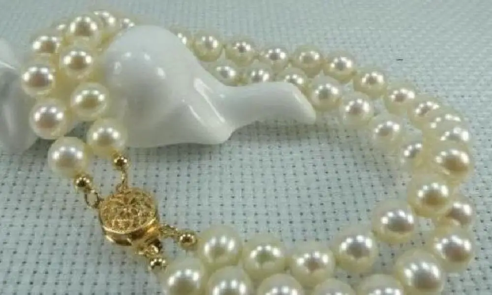 beautiful 2row 8mm Natural white south sea shell pearl bracelet button >>free shipping
beautiful 2row 8mm Natural white south sea shell pearl bracelet button >>free shipping