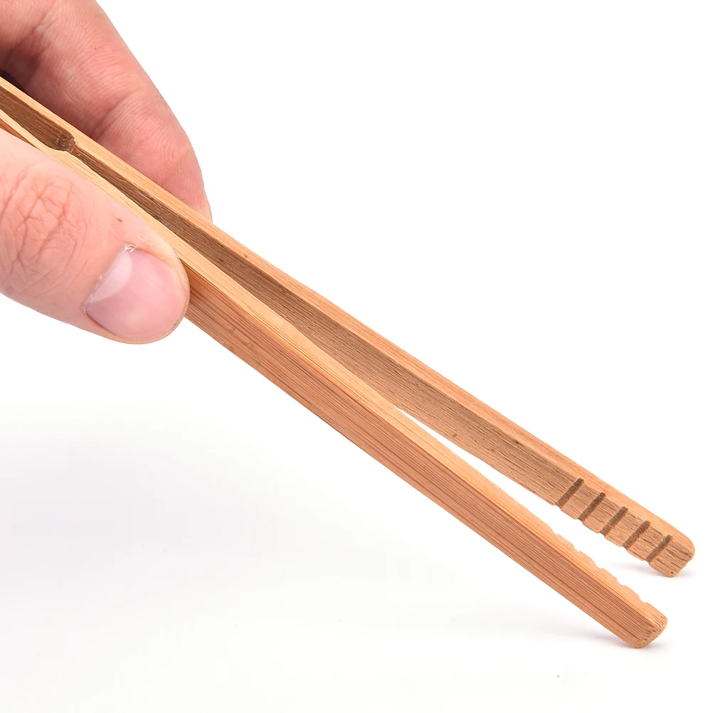 High quality 14.5cm Tweezers Wood Color Textured Bamboo Kongfu Tea Utensil Tweezers
High quality 14.5cm Tweezers Wood Color Textured Bamboo Kongfu Tea Utensil Tweezers